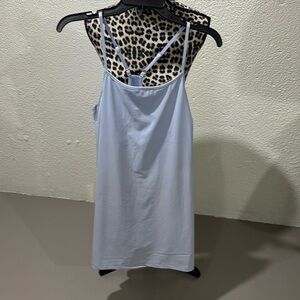 NWOT lilac tennis/golf dress w/shorts attached & pockets. Adjustable straps KCB